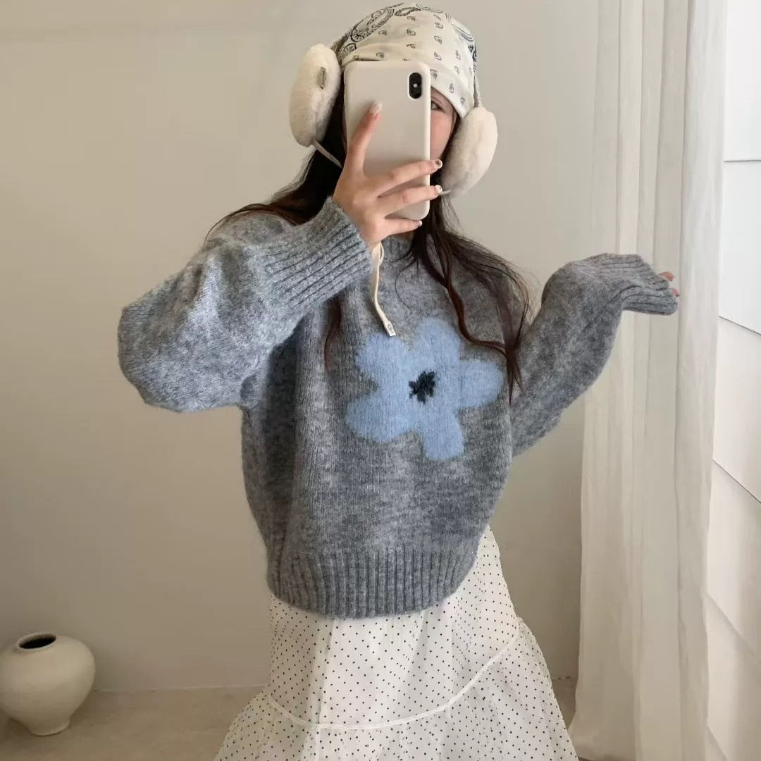 Pull femme avec design floral et matériau à poils longs Chic und Stil