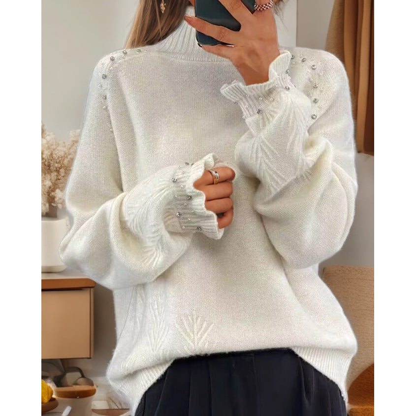 Pull pour femmes avec col roulé élégant et détails scintillants Chic und Stil