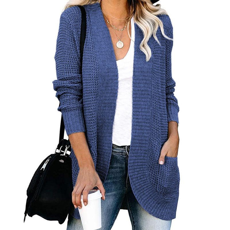 Veste en tricot pour femmes avec un motif de tricot moderne et des poches pratiques Chic und Stil