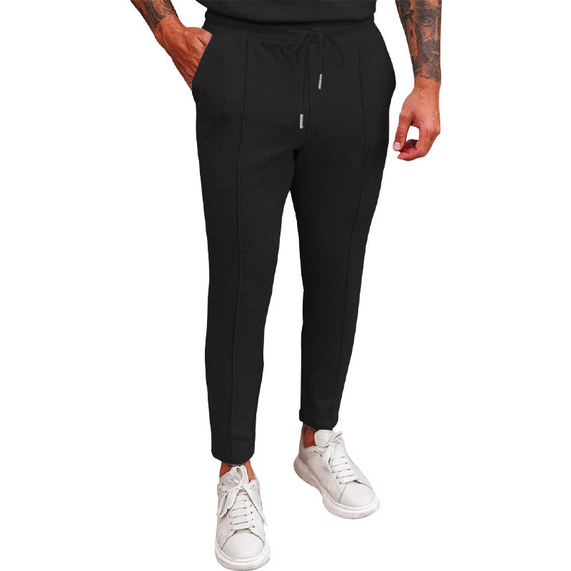 Pantalon de jogging sportif pour hommes avec taille élastique et poches zippées Chic und Stil