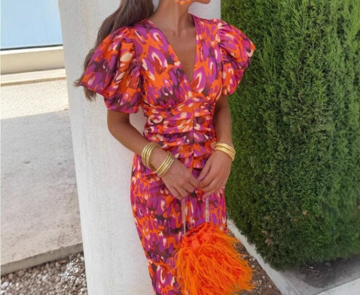Robe de soirée cintrée pour femmes avec manches bouffantes et décolleté en V Chic und Stil