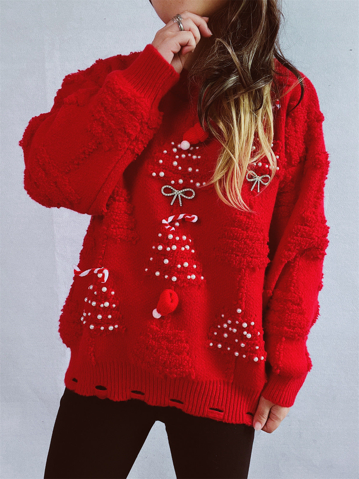 Pull over de fête pour dames avec des motifs de Noël créatifs et un design texturé Chic und Stil