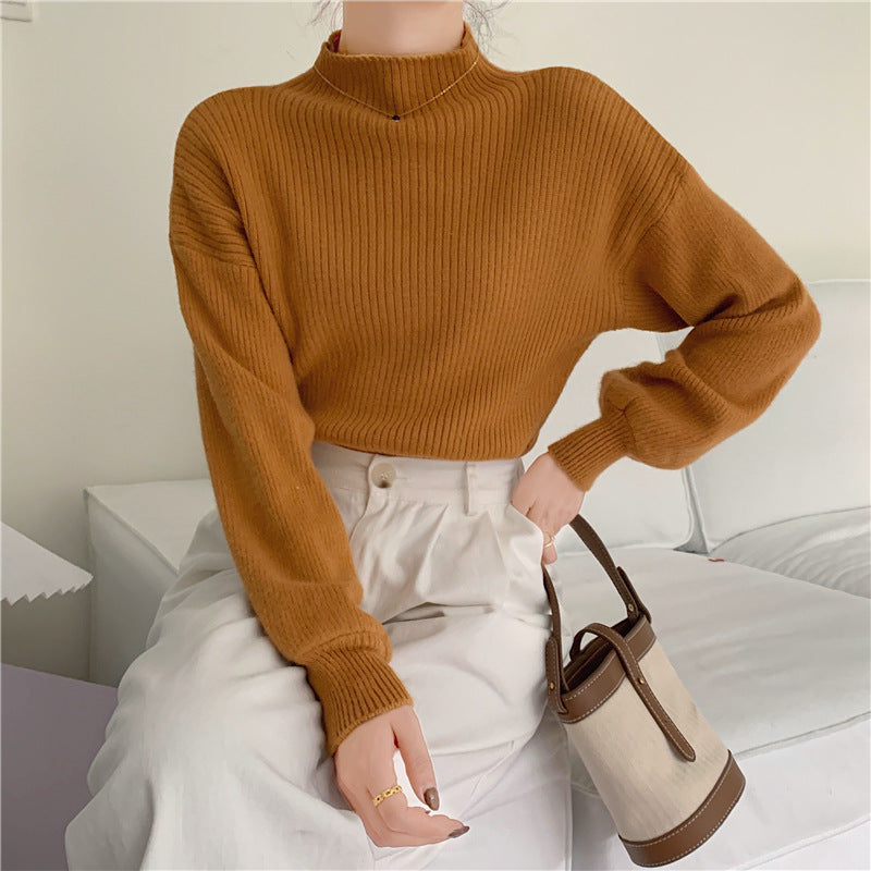 Pull femme tendance avec col montant et structure côtelée Chic und Stil