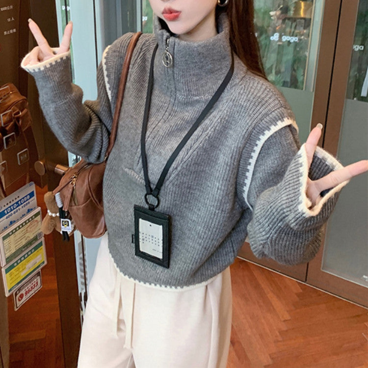 Pull femme tendance avec col montant et finitions de manches spéciales Chic und Stil