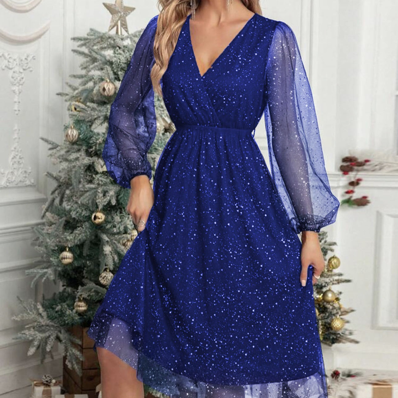 Robe midi glamour pour femmes avec des manches bouffantes transparentes et un motif de sequins scintillants Chic und Stil