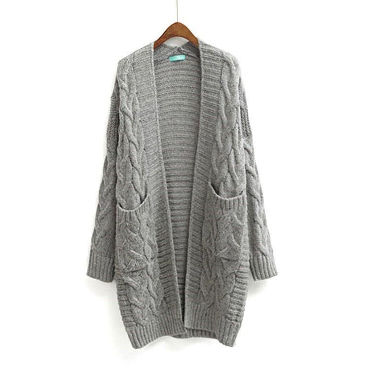 Dames cardigan avec motif de tresse épaisse et poches Chic und Stil