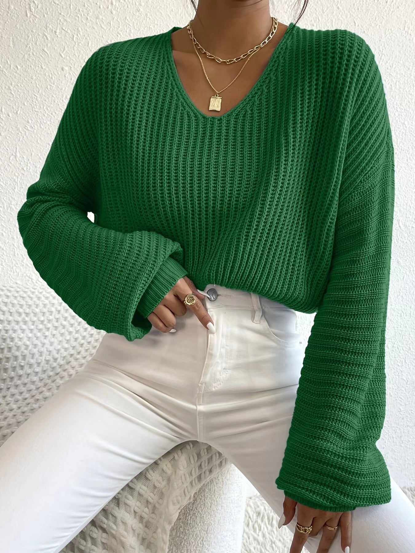 Pull V dames avec des manches larges et un motif tricot structuré Chic und Stil