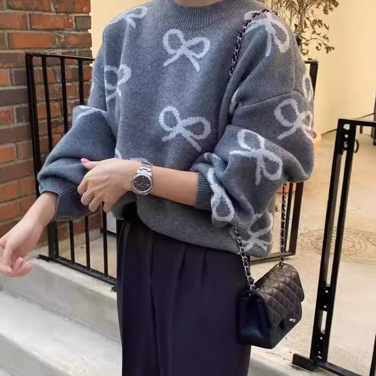 Dames Pull doux avec motif romantique en nœud Chic und Stil