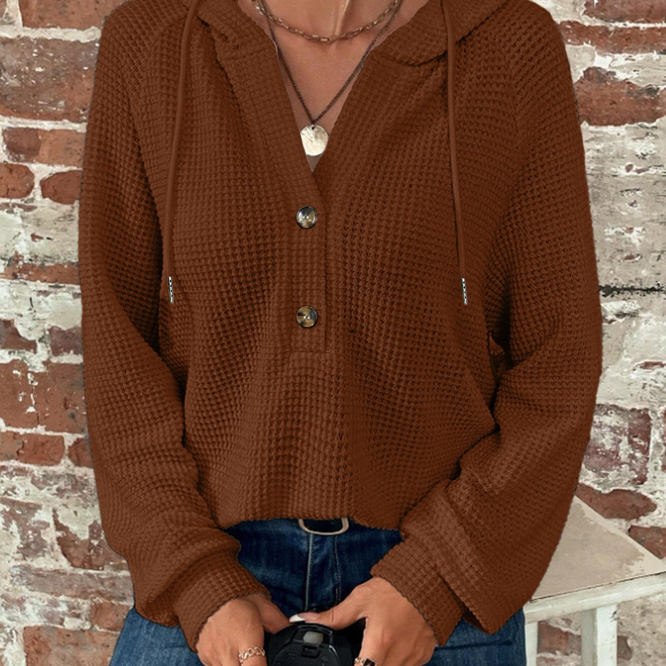 Pull à capuche décontracté pour femmes avec des détails en boutons et un tissu structuré Chic und Stil