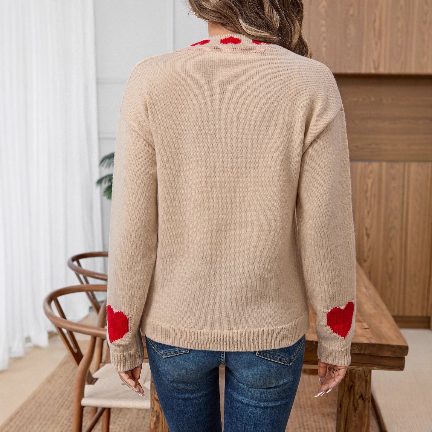 Veste en tricot pour femmes avec des motifs de cœur romantiques et un look lacé Chic und Stil