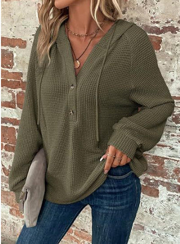 Pull à capuche décontracté pour femmes avec des détails en boutons et un tissu structuré Chic und Stil