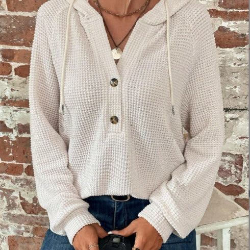 Pull à capuche décontracté pour femmes avec des détails en boutons et un tissu structuré Chic und Stil