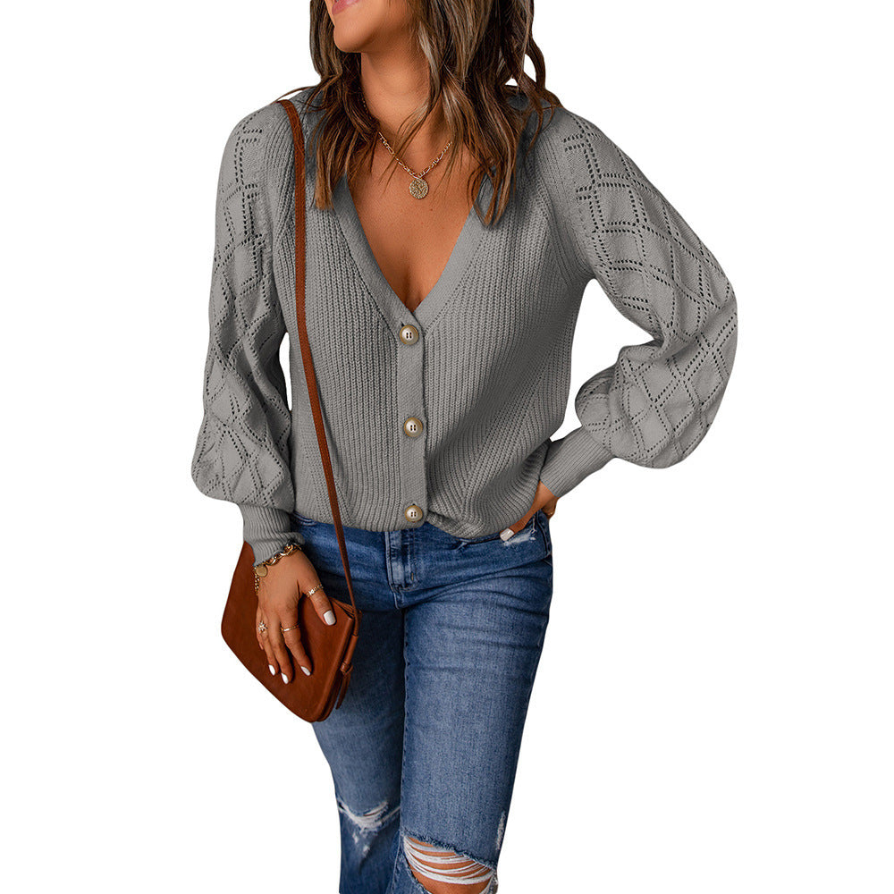 Dame cardigan avec motif de côtes romantique et détails de boutons élégants Chic und Stil