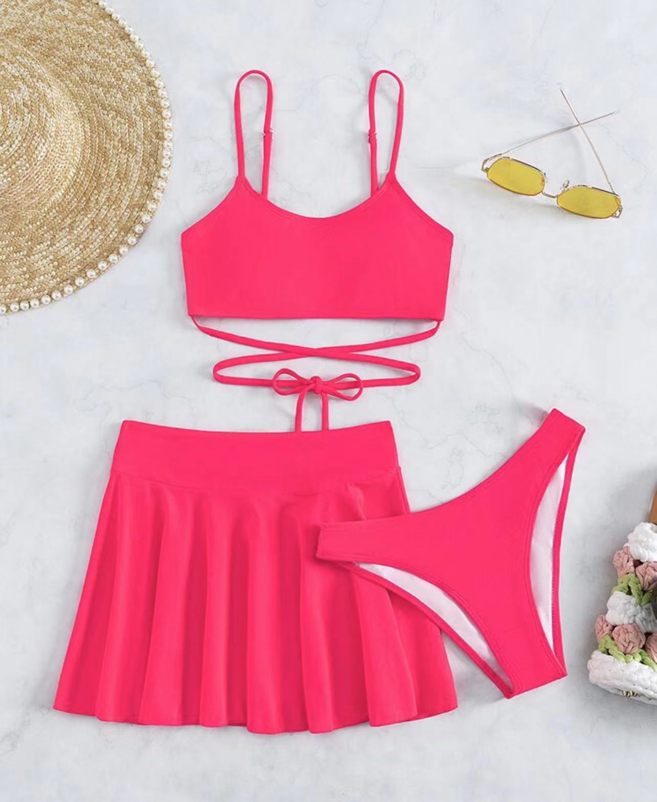 Women's bikini set with a playfully cut top and a feminine wrap skirt Chic und Stil