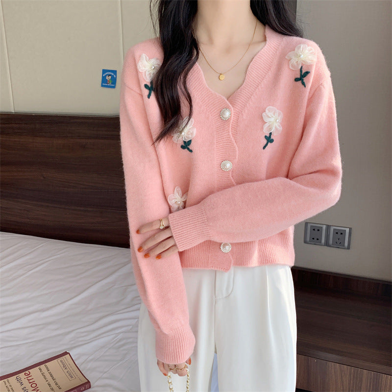 Bouton de cardigan féminin ludique avec broderie florale et boutons en perles Chic und Stil