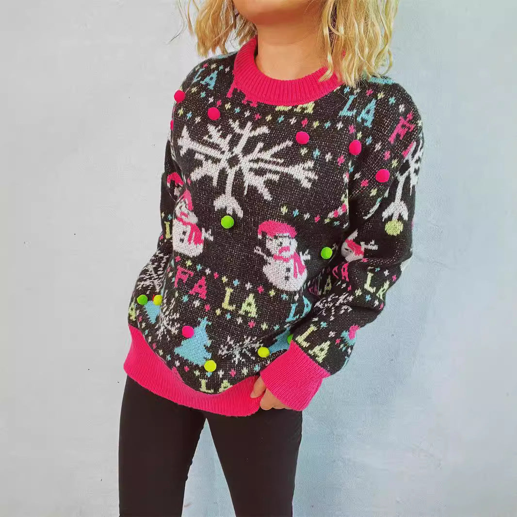 Pull féminin de Noël avec des applications colorées et un design festif Chic und Stil