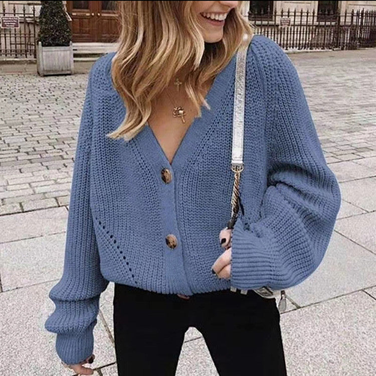 Veste en maille épaisse pour dames avec des détails de boutons élégants et des épaules tombantes Chic und Stil