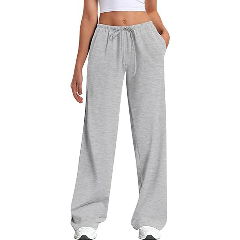 Loose sports pants for women with elastic waistband and side pockets Chic und Stil