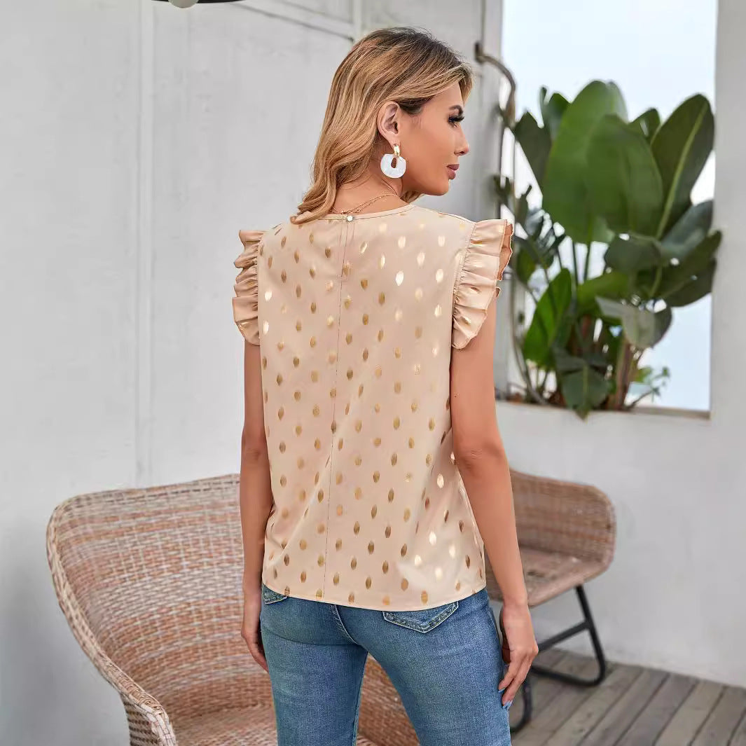 Chemisier pour femmes avec des détails en volants et un motif à pois dorés Chic und Stil