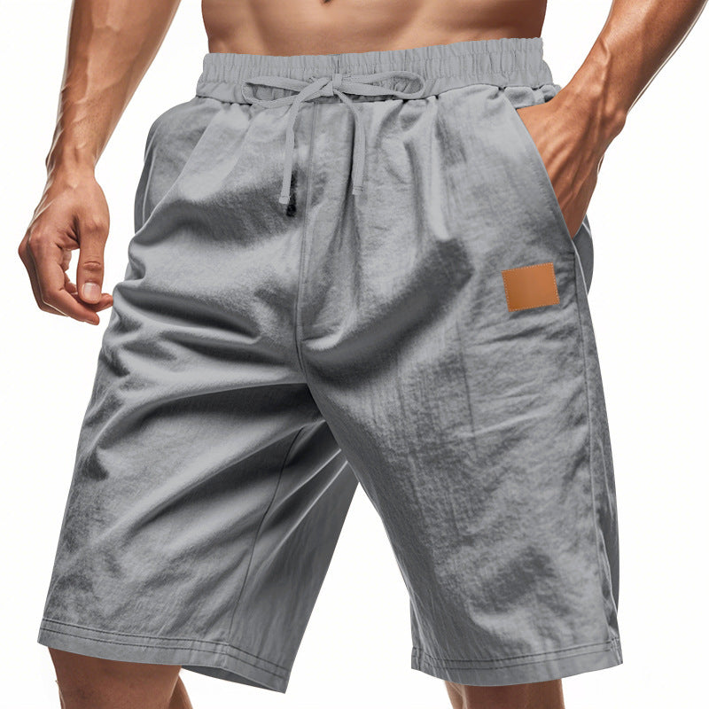 Shorts de sport décontractés pour hommes avec taille élastique et poches pratiques Chic und Stil