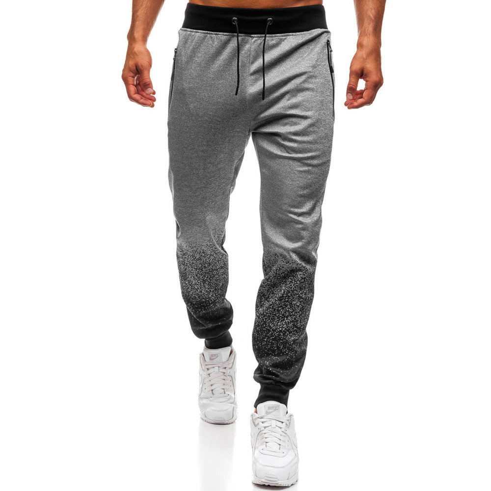 Pantalon de jogging sportif pour hommes avec dégradé de couleurs raffiné et poches à fermeture éclair pratiques Chic und Stil
