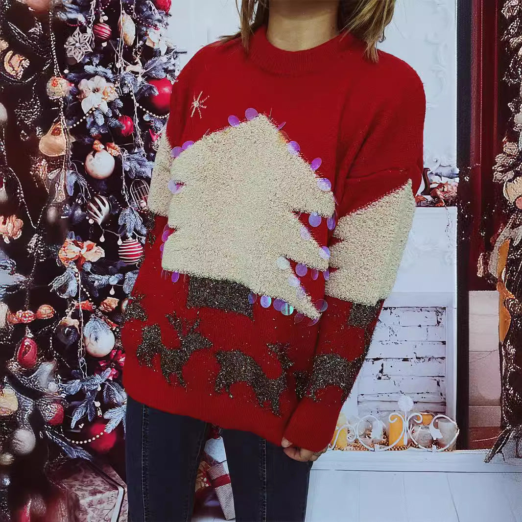 Pull féminin festif avec motif de Noël et appliqués scintillants Chic und Stil