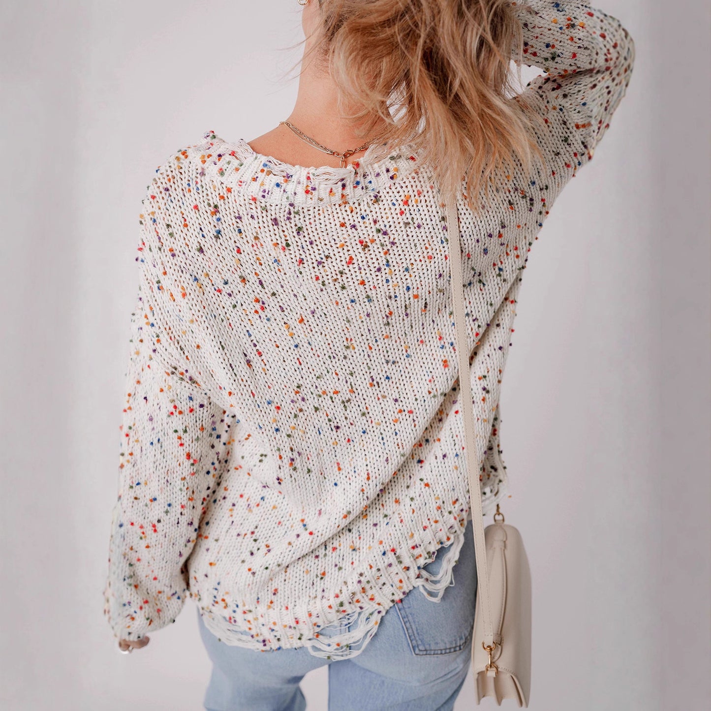 Pull en tricot décontracté pour femmes avec un design à éclaboussures colorées et un col rond confortable Chic und Stil