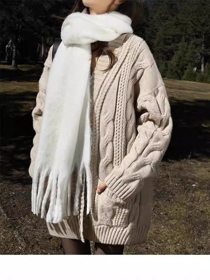 Cardigan en tricot pour femmes avec décolleté en V profond et motif torsadé structuré Chic und Stil