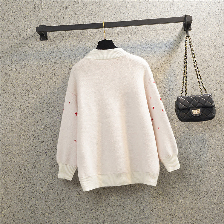 Pull féminin de Noël avec motif de renne festif et col rond confortable Chic und Stil