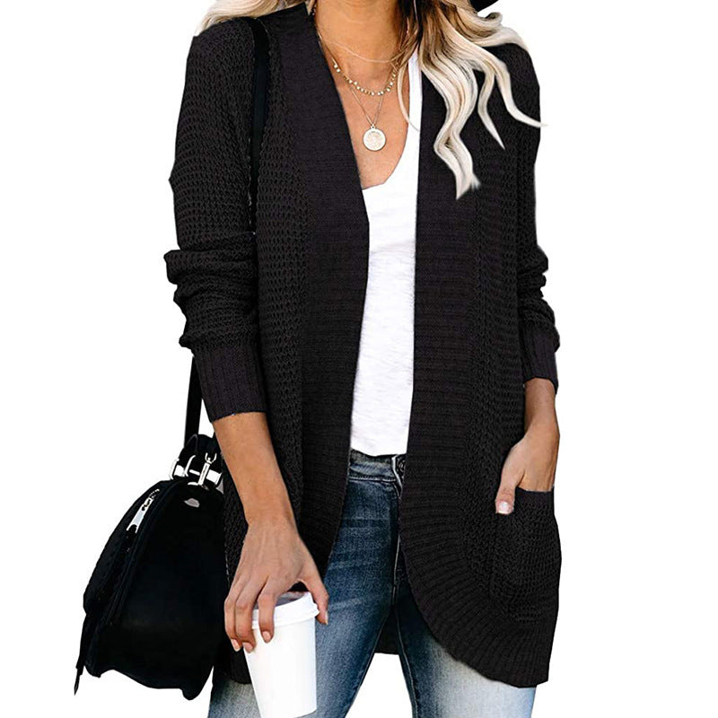 Veste en tricot pour femmes avec un motif de tricot moderne et des poches pratiques Chic und Stil
