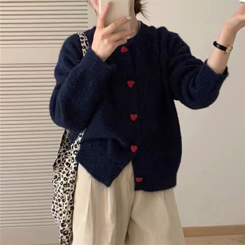Dames pull-over tricot doux avec boutons en forme de cœur Chic und Stil