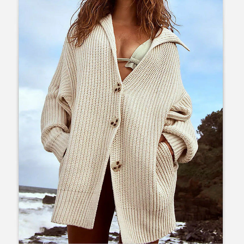 Veste en grosse maille pour femmes avec des manches larges et une capuche Chic und Stil