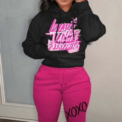 Leisure hoodie and jogger pants set for women with unique lettering and modern accents Chic and Style