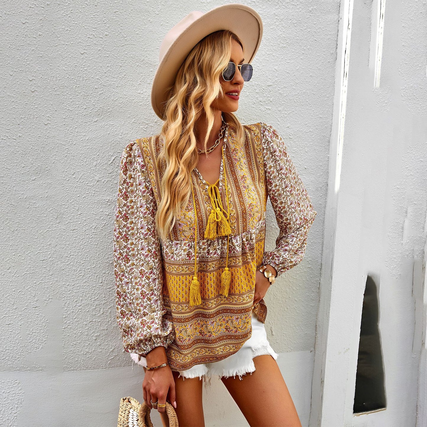 Airy feminine blouse with trendy boho pattern and elegant ruffle details Chic und Stil
