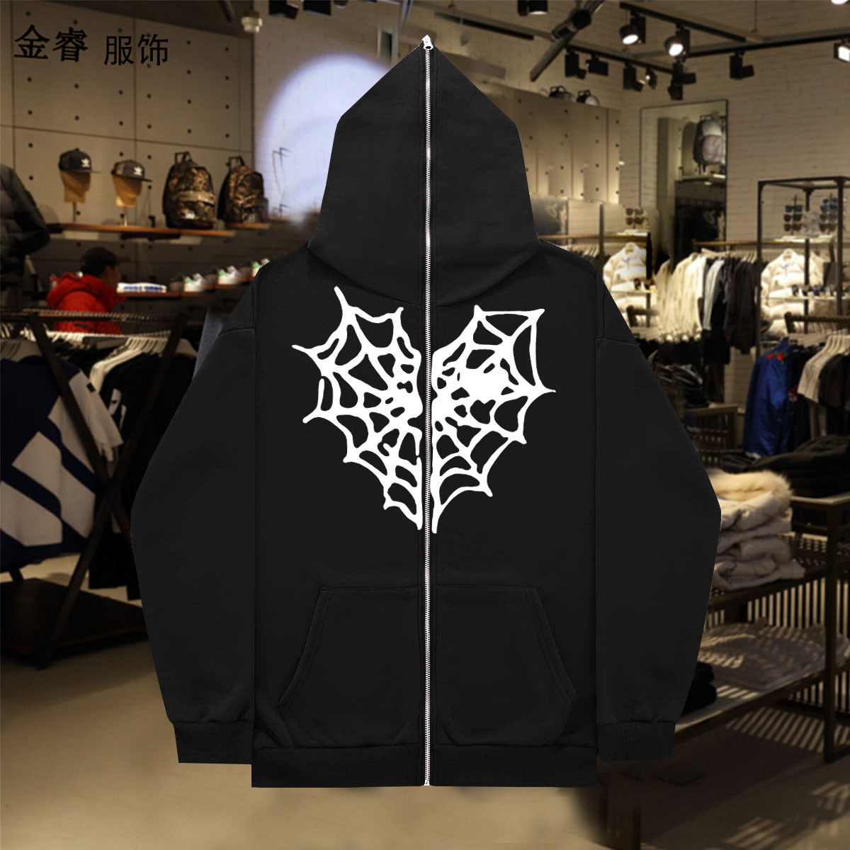 Dame Hoodie avec un design de toile d'araignée saisissant Chic und Stil