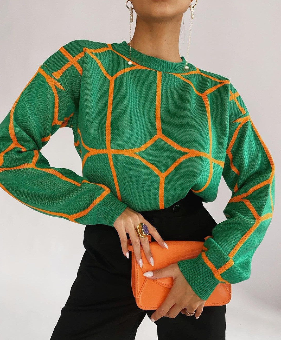 Pull en maille tendance pour femmes avec un design géométrique accrocheur Chic und Stil