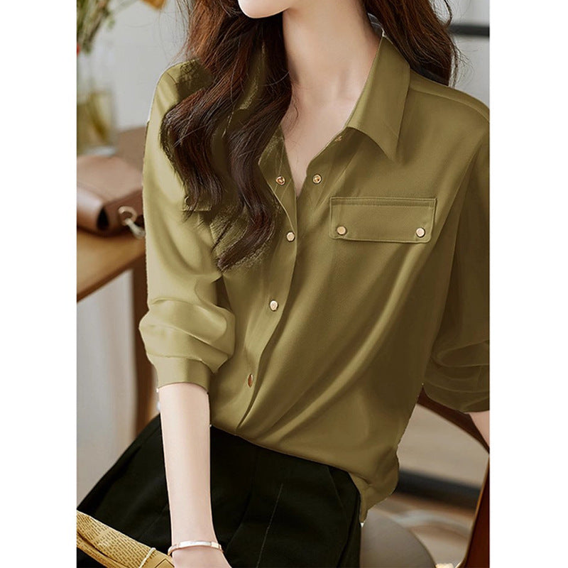 Blouse élégante à boutons pour femme avec accents dorés Chic und Stil