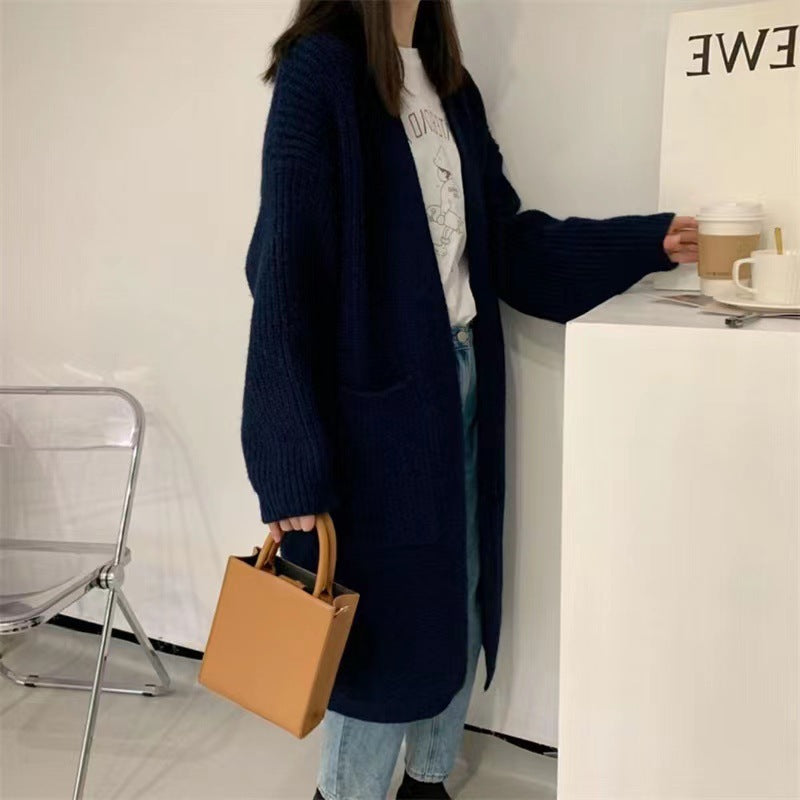 Cardigan en tricot féminin avec une silhouette décontractée et des poches profondes Chic und Stil