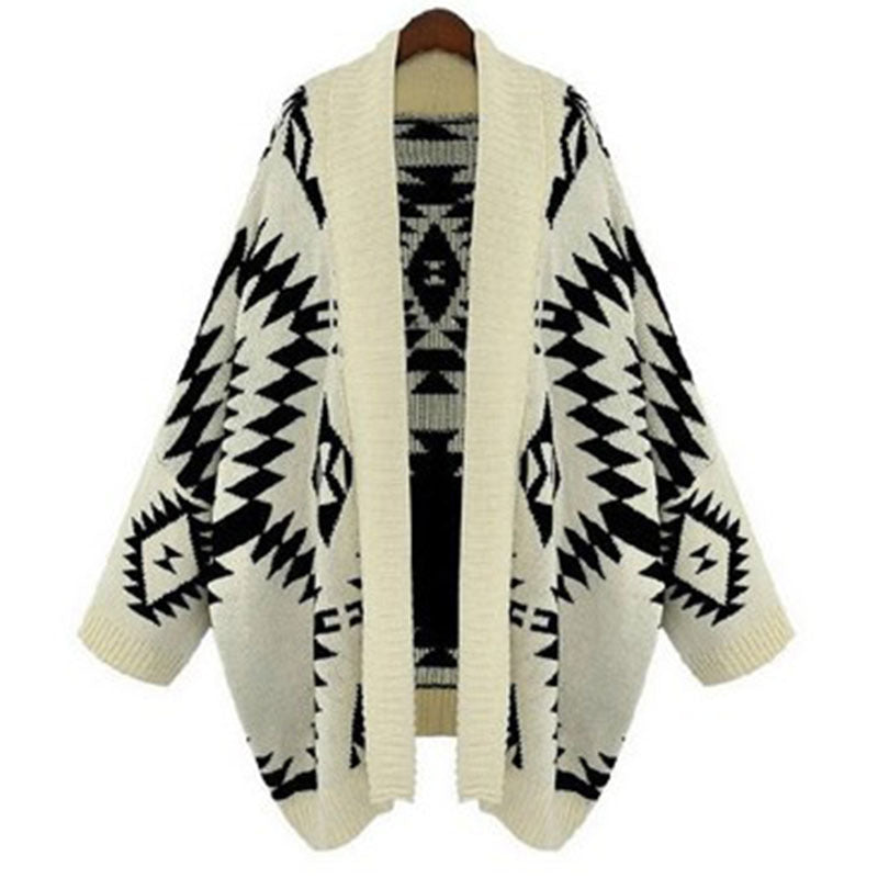 Poncho en tricot pour femmes avec un motif géométrique frappant Chic und Stil