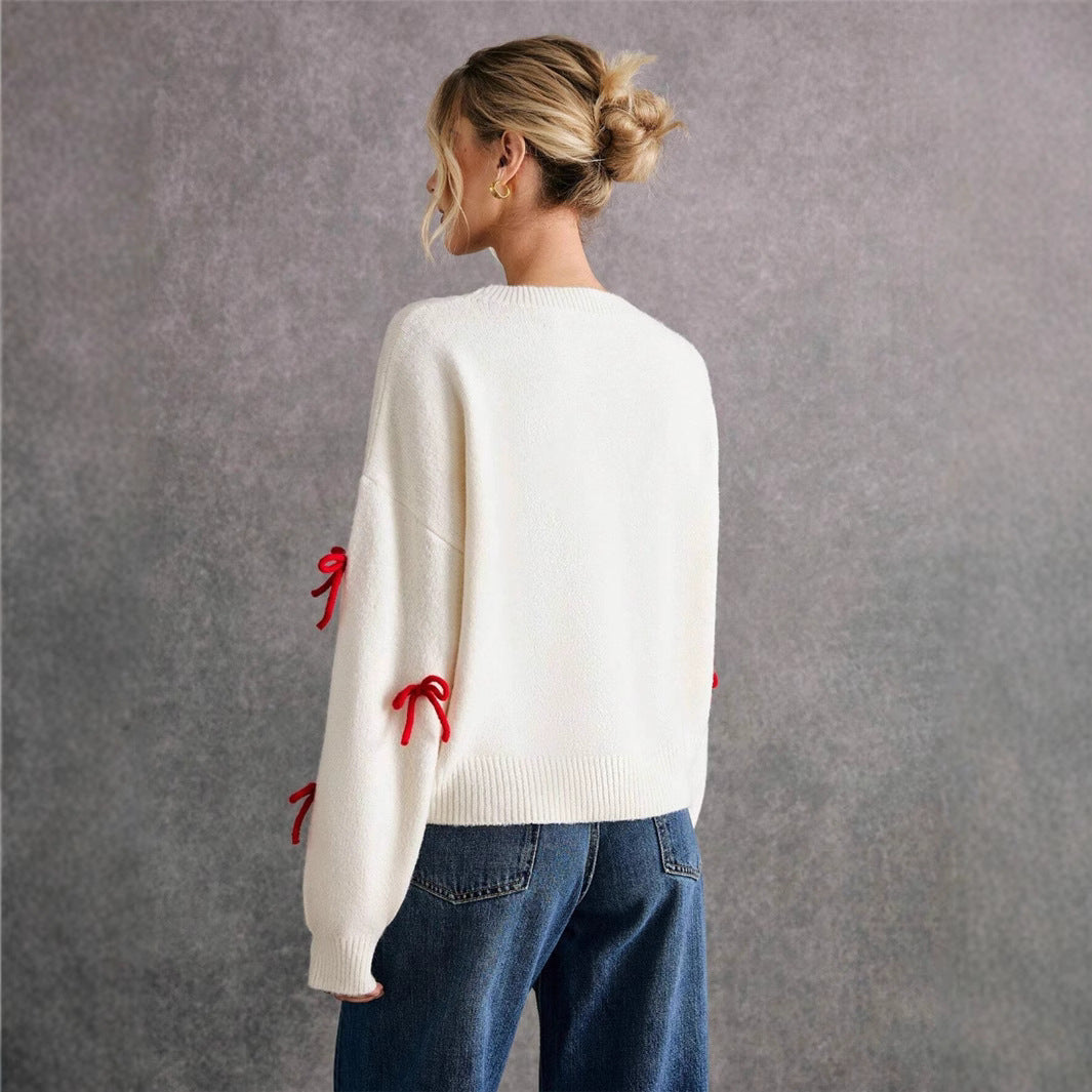 Pull femme avec des éléments de nœud décoratifs et une coupe moderne Chic und Stil