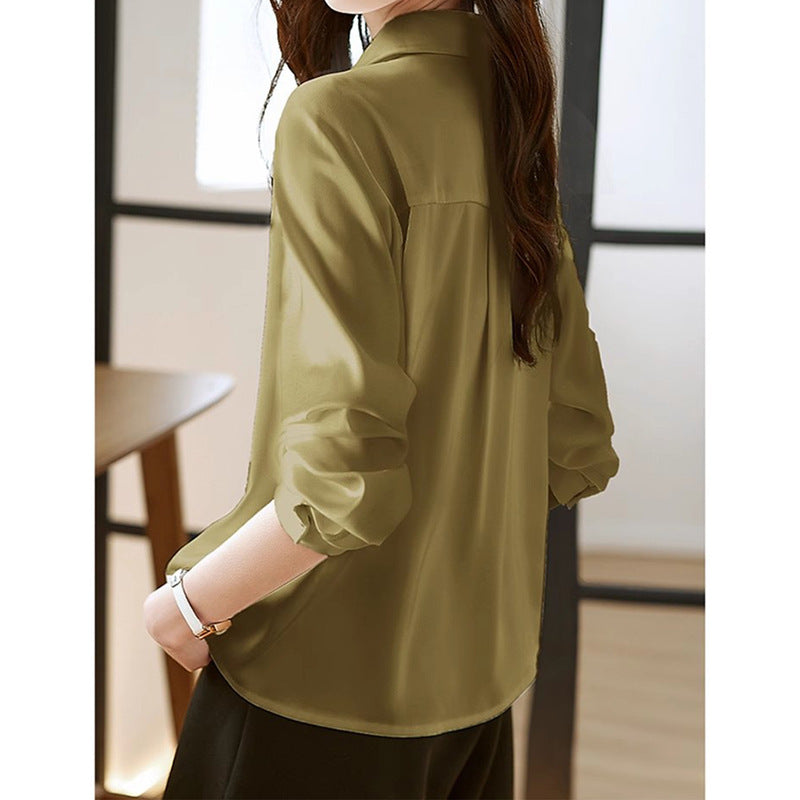 Blouse élégante à boutons pour femme avec accents dorés Chic und Stil