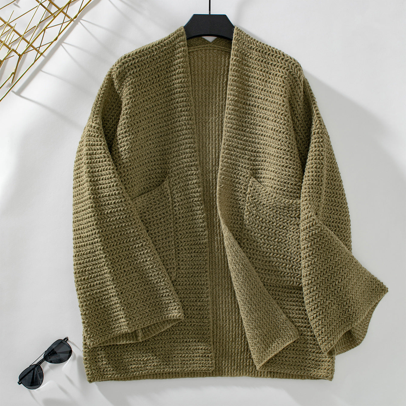 Veste en tricot aérienne pour femmes avec grandes poches et manches ouvertes Chic und Stil