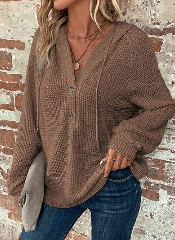 Pull à capuche décontracté pour femmes avec des détails en boutons et un tissu structuré Chic und Stil
