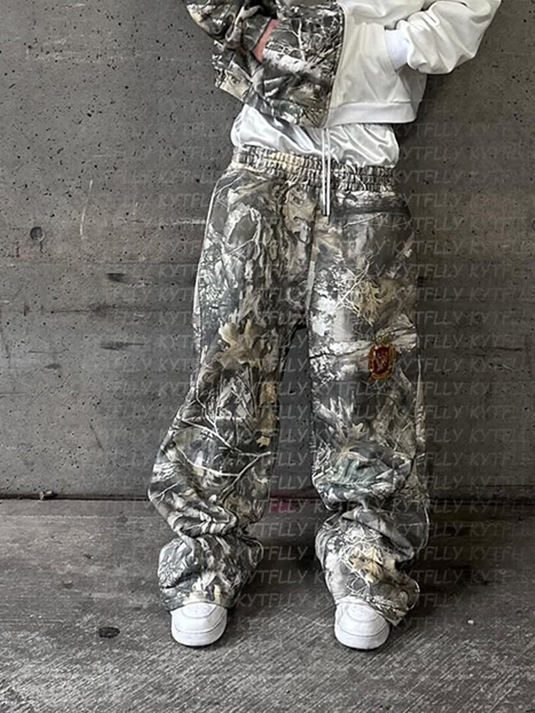 Pantalon de jogging camouflage pour femmes avec taille élastique et poches latérales Chic und Stil