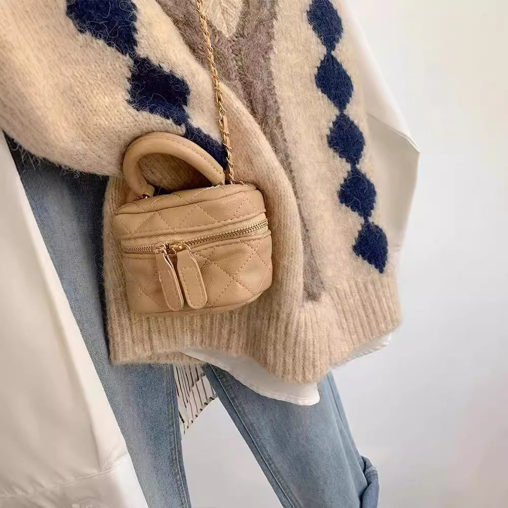 Pull en tricot pour femmes avec décolleté en V et motif géométrique Chic und Stil