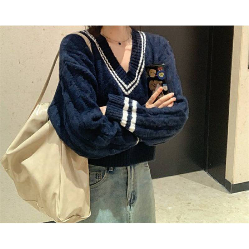 Pull en tricot à col en V et motif en relief pour dames Chic und Stil