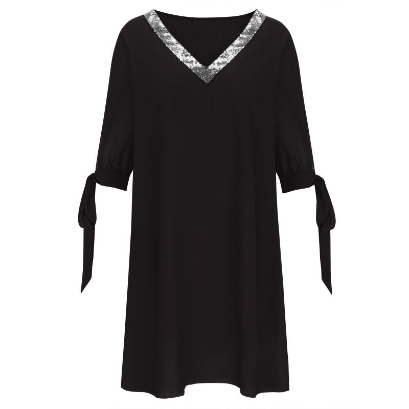 Robe femme flatteuse à décolleté en V avec ornements en sequins Chic und Stil