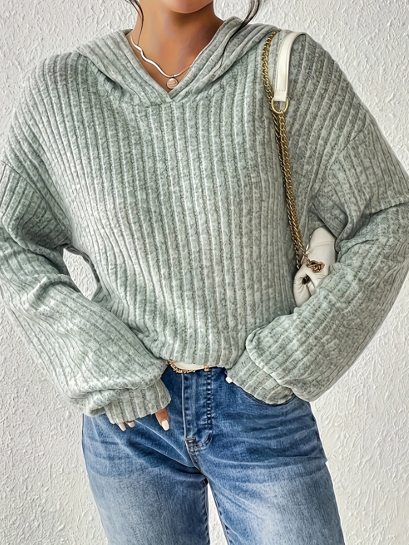 Pull décontracté pour femmes avec design en rib côtelé texturé et col à capuche confortable Chic und Stil