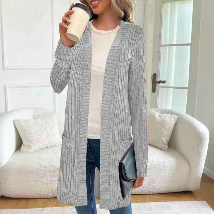 Veste tricotée longue pour femmes avec poches latérales et design texturé Chic und Stil