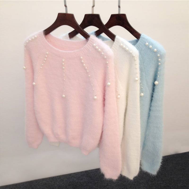 Pull femme élégant avec des accents de perles élégants Chic und Stil